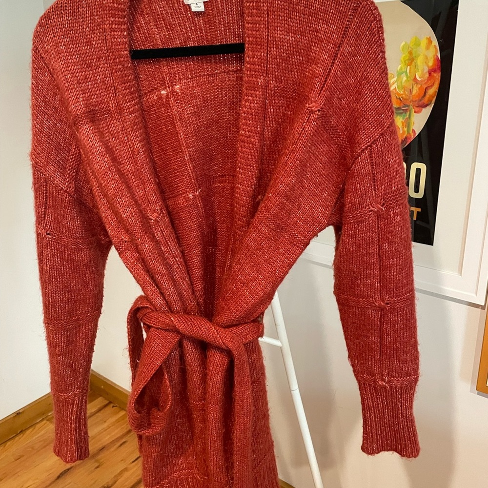 Long tie sweater